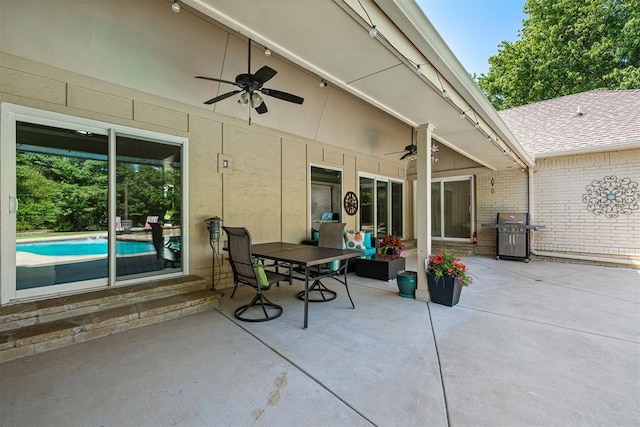 1704 Faircloud Dr, Edmond, OK 73034 - view of patio featuring a ceiling fan, grilling area, an outdoor pool, and outdoor dining area