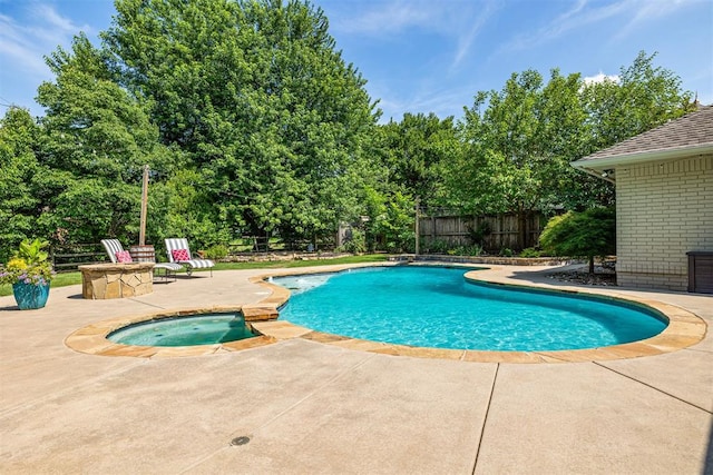 1704 Faircloud Dr, Edmond, OK 73034 - view of pool featuring a patio area, a fenced backyard, and an in-ground hot tub