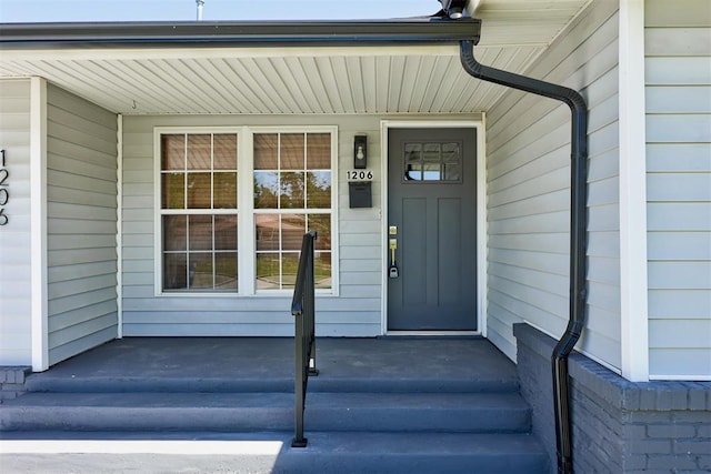 1206 Monroe Dr, Shawnee, OK 74804 - view of exterior entry with covered porch