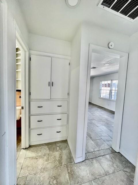 1228 Santa Fe Dr, Clinton, OK 73601 - hallway with baseboards