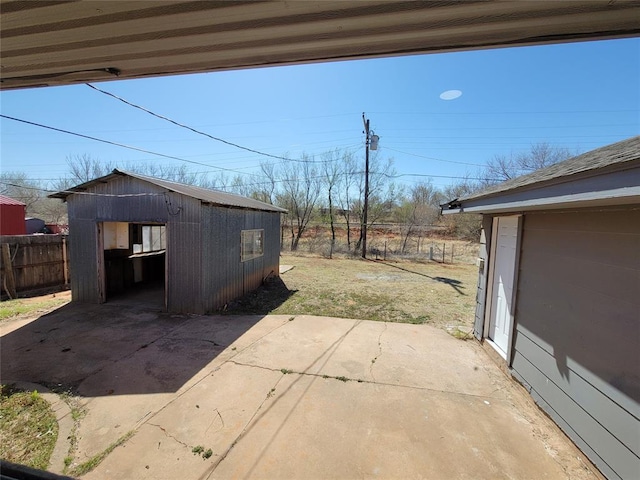 1228 Santa Fe Dr, Clinton, OK 73601 - view of patio / terrace featuring an outbuilding