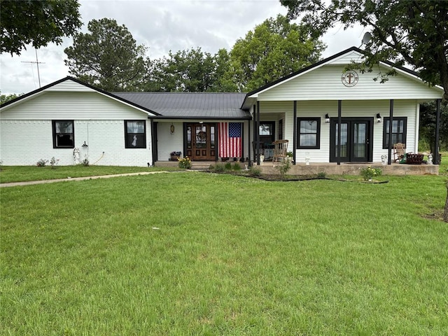 32629 S Airline Rd, Pauls Valley, OK 73075 - ranch-style house featuring covered porch, a front yard, and french doors