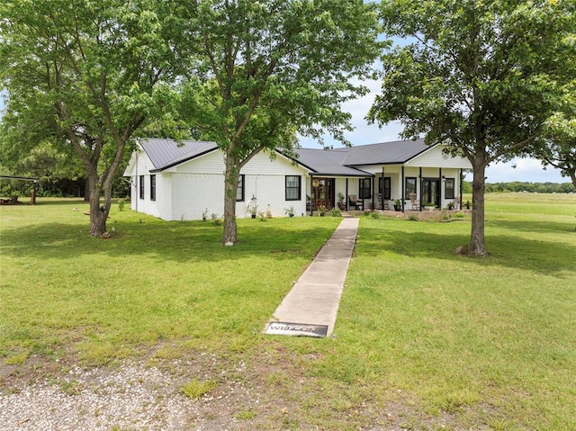 32629 S Airline Rd, Pauls Valley, OK 73075 - view of front facade featuring a front lawn and a metal roof