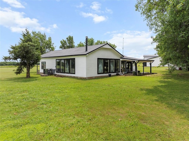 32629 S Airline Rd, Pauls Valley, OK 73075 - rear view of house featuring a lawn