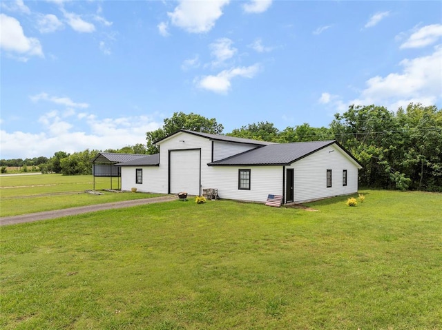 32629 S Airline Rd, Pauls Valley, OK 73075 - view of front of property featuring a front lawn, a metal roof, and asphalt driveway