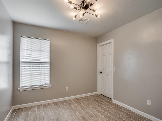 4100 S Noma Rd, Oklahoma City, OK 73150 - empty room featuring light wood finished floors and baseboards