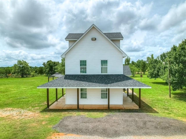 4100 S Noma Rd, Oklahoma City, OK 73150 - view of home's exterior featuring roof with shingles, a yard, and a porch