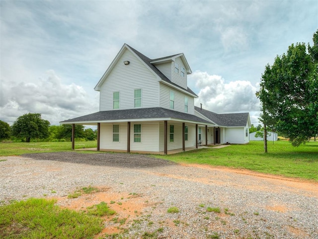 4100 S Noma Rd, Oklahoma City, OK 73150 - farmhouse inspired home featuring driveway, a front yard, a porch, and roof with shingles