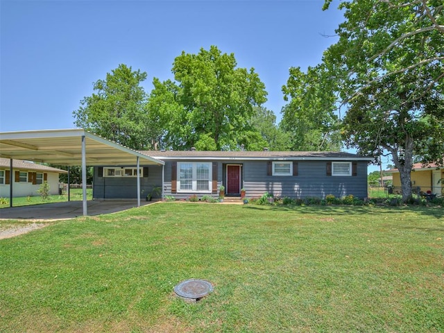 303 W Meek St, Wayne, OK 73095 - single story home with concrete driveway and a carport