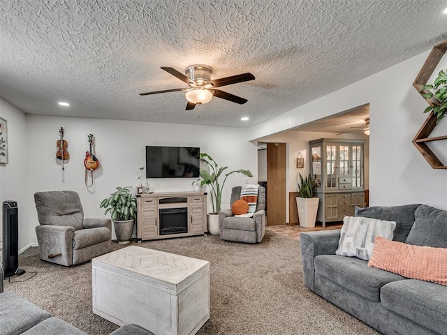 303 W Meek St, Wayne, OK 73095 - living area with carpet flooring, ceiling fan, a textured ceiling, and recessed lighting