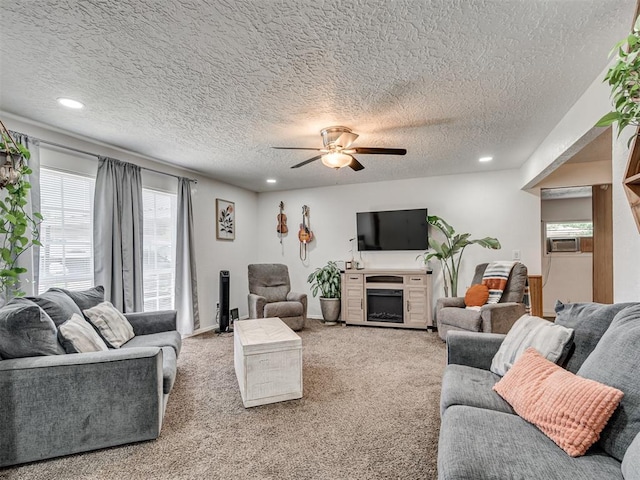 303 W Meek St, Wayne, OK 73095 - living area with a ceiling fan, recessed lighting, a textured ceiling, light carpet, and cooling unit