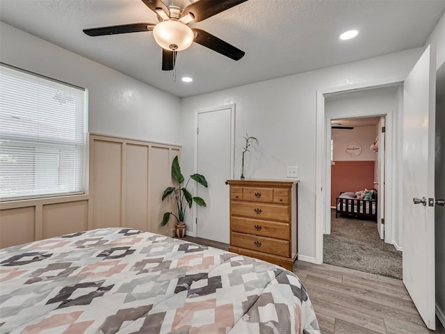 303 W Meek St, Wayne, OK 73095 - bedroom featuring light wood-type flooring, a closet, recessed lighting, and ceiling fan