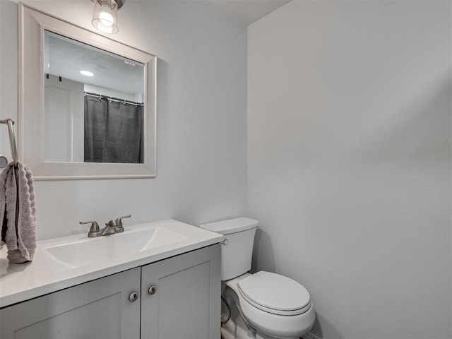 303 W Meek St, Wayne, OK 73095 - bathroom featuring vanity and toilet