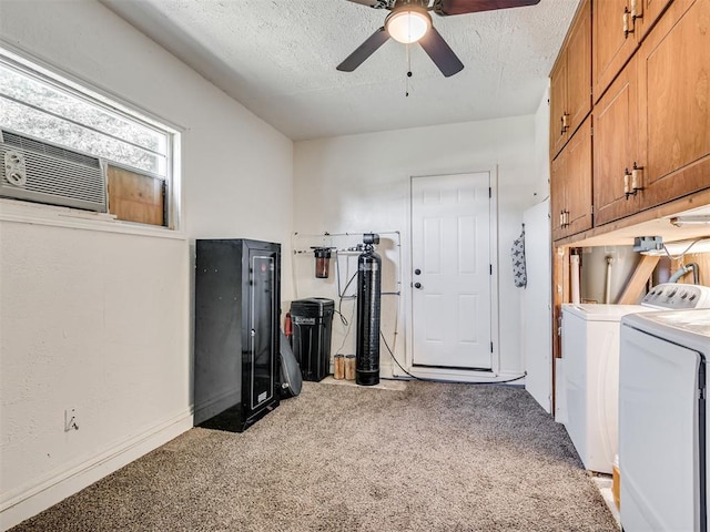 303 W Meek St, Wayne, OK 73095 - laundry room with washer and dryer, light colored carpet, a textured ceiling, cabinet space, and a ceiling fan