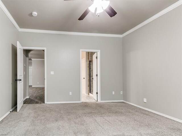 8344 NW 137th St, Oklahoma City, OK 73142 - unfurnished bedroom with crown molding, carpet, baseboards, a ceiling fan, and connected bathroom