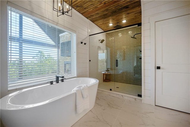 72 Green Persimmon Trl, Broken Bow, OK 74728 - bathroom with wood ceiling, a stall shower, a freestanding bath, marble look tile flooring, and recessed lighting
