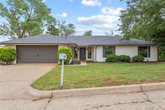 1206 N Kaiser Rd, Weatherford, OK 73096 - ranch-style home with an attached garage, driveway, a front yard, and a shingled roof