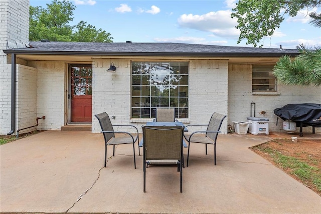 1206 N Kaiser Rd, Weatherford, OK 73096 - view of patio featuring a grill and outdoor dining space