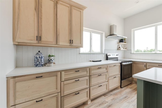 1619 NE 9th St, Oklahoma City, OK 73106 - kitchen with wall chimney exhaust hood, electric range, light brown cabinets, and tasteful backsplash
