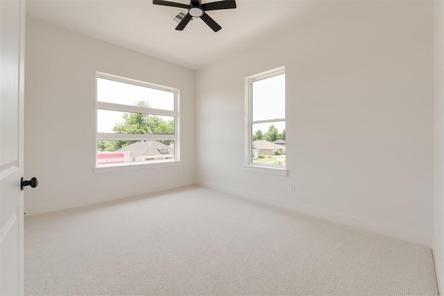 1619 NE 9th St, Oklahoma City, OK 73106 - spare room with carpet, a ceiling fan, and baseboards