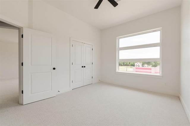 1619 NE 9th St, Oklahoma City, OK 73106 - unfurnished bedroom featuring carpet floors, a closet, and a ceiling fan