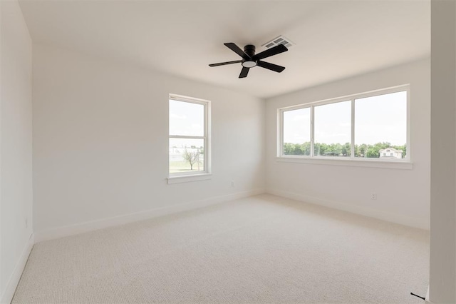 1619 NE 9th St, Oklahoma City, OK 73106 - carpeted empty room with baseboards and ceiling fan