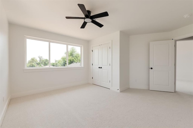 1619 NE 9th St, Oklahoma City, OK 73106 - unfurnished bedroom with light colored carpet, baseboards, and a closet