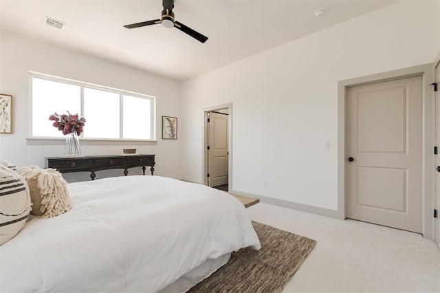 1619 NE 9th St, Oklahoma City, OK 73106 - bedroom featuring light colored carpet and ceiling fan
