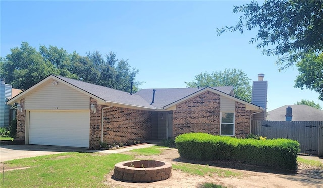 3512 Tiffany Dr, Moore, OK 73160 - ranch-style home featuring brick siding, a garage, a fire pit, and concrete driveway