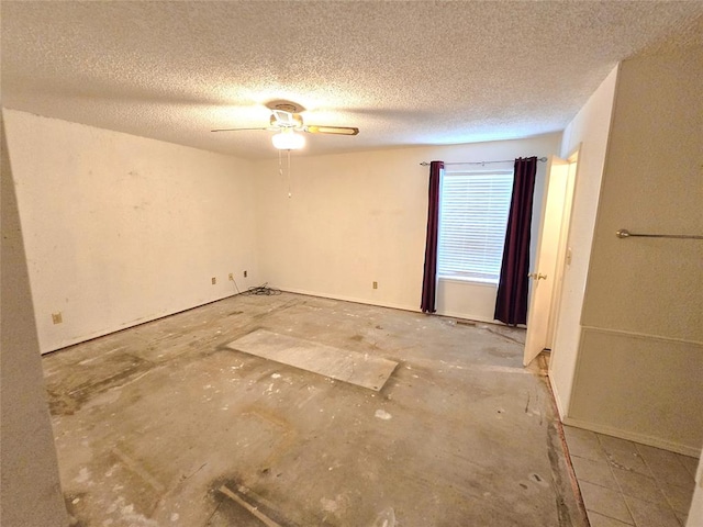 3512 Tiffany Dr, Moore, OK 73160 - spare room featuring ceiling fan and a textured ceiling