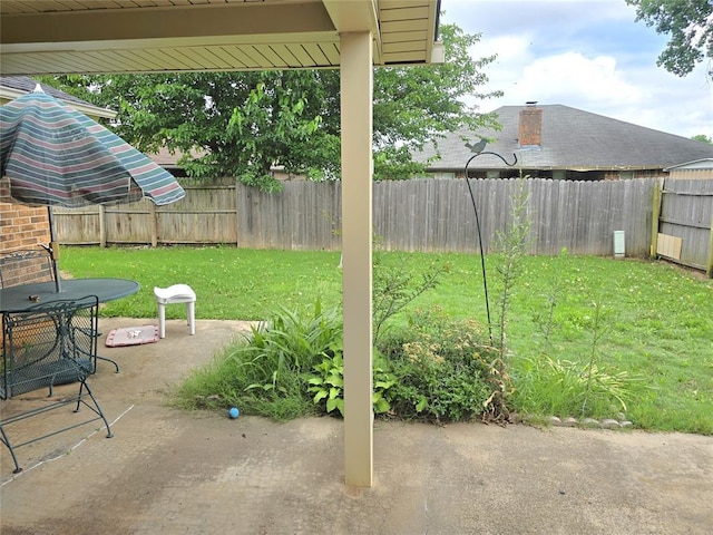 3512 Tiffany Dr, Moore, OK 73160 - fenced backyard with a patio