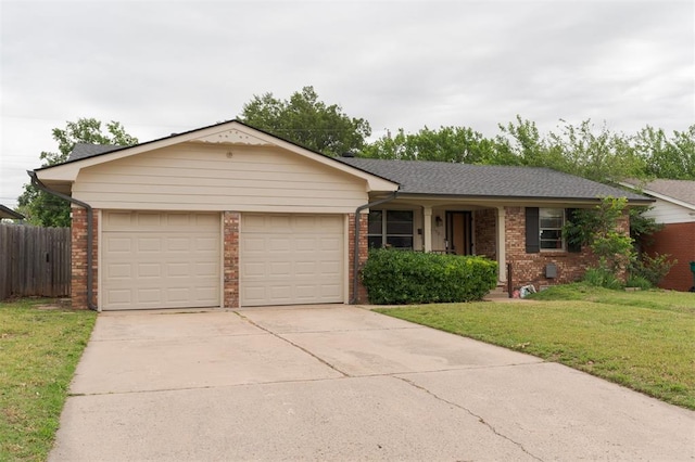 3901 NW 56th Pl, Oklahoma City, OK 73112 - single story home featuring brick siding, a garage, and concrete driveway