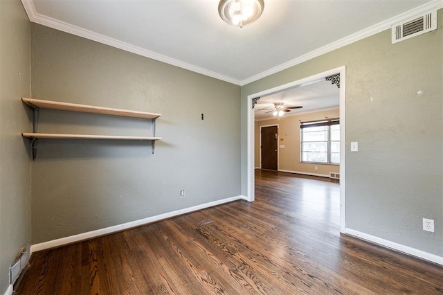 3901 NW 56th Pl, Oklahoma City, OK 73112 - spare room with wood finished floors, crown molding, a ceiling fan, and baseboards
