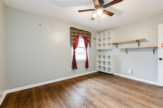 3901 NW 56th Pl, Oklahoma City, OK 73112 - unfurnished room with wood finished floors, a ceiling fan, and baseboards