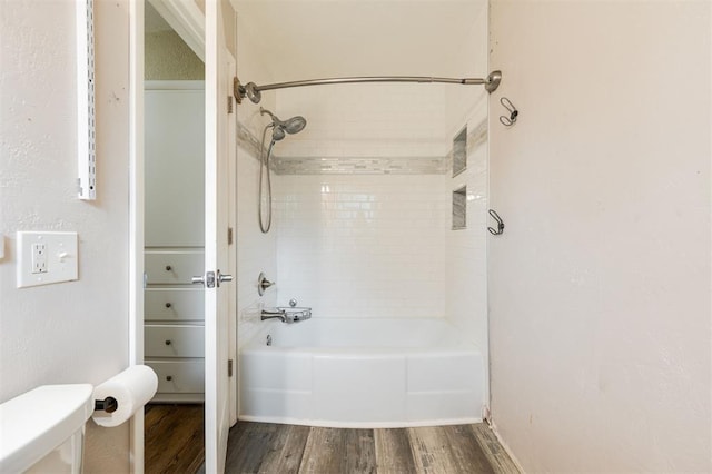 3901 NW 56th Pl, Oklahoma City, OK 73112 - full bath featuring wood finished floors, toilet, and shower / bathtub combination