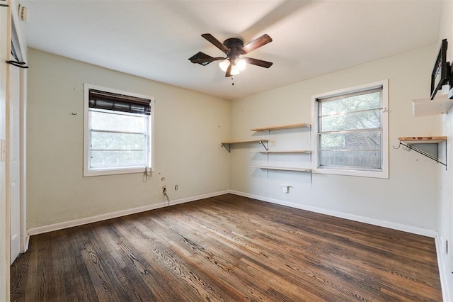 3901 NW 56th Pl, Oklahoma City, OK 73112 - unfurnished room with a ceiling fan, wood finished floors, and baseboards