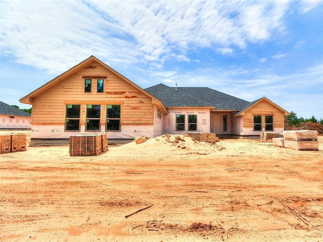 11701 Ward Rd, Edmond, OK 73034 - rear view of house with roof with shingles