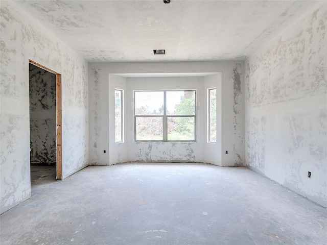 11701 Ward Rd, Edmond, OK 73034 - spare room featuring concrete floors