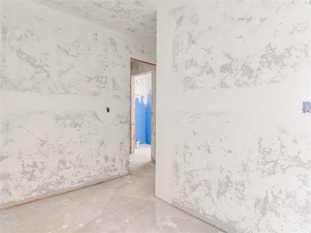 11701 Ward Rd, Edmond, OK 73034 - empty room with unfinished concrete floors