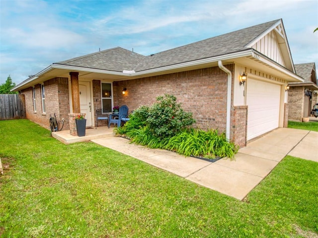 12825 William Penn Blvd, Oklahoma City, OK 73120 - view of front of property featuring brick siding, a garage, roof with shingles, and board and batten siding
