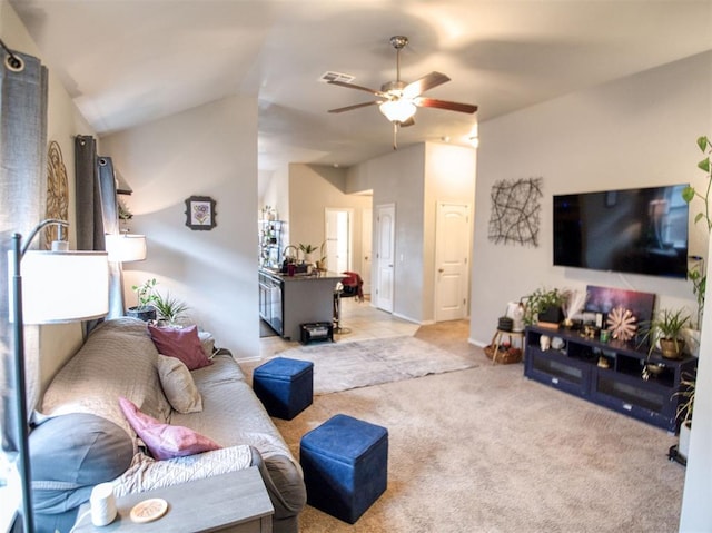 12825 William Penn Blvd, Oklahoma City, OK 73120 - living area with ceiling fan, light carpet, lofted ceiling, and baseboards
