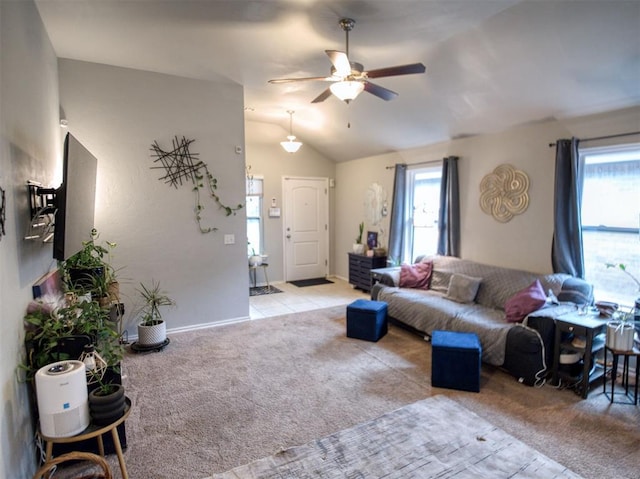 12825 William Penn Blvd, Oklahoma City, OK 73120 - carpeted living area featuring ceiling fan, vaulted ceiling, and baseboards