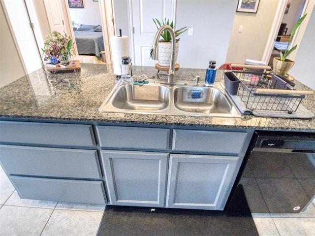 12825 William Penn Blvd, Oklahoma City, OK 73120 - kitchen with a sink, dishwashing machine, gray cabinetry, and tile patterned floors