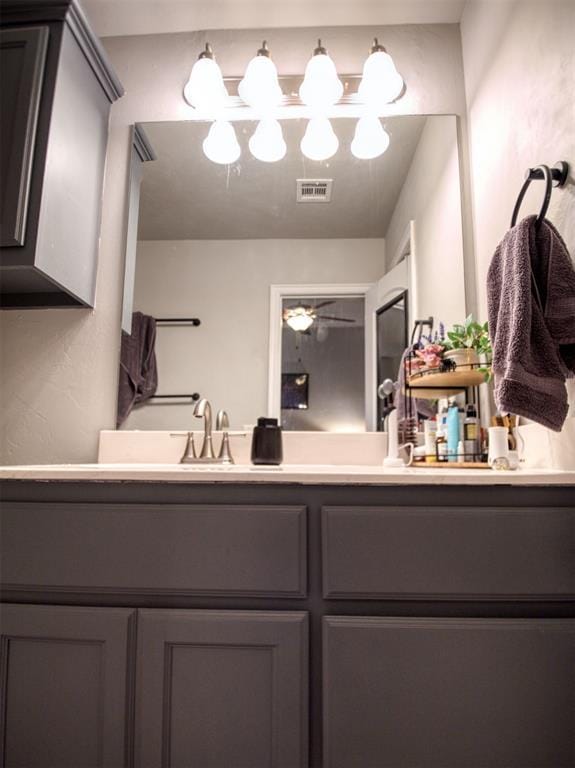 12825 William Penn Blvd, Oklahoma City, OK 73120 - bathroom with vanity and a ceiling fan