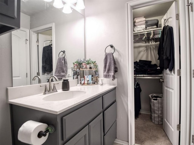 12825 William Penn Blvd, Oklahoma City, OK 73120 - bathroom with vanity and a spacious closet