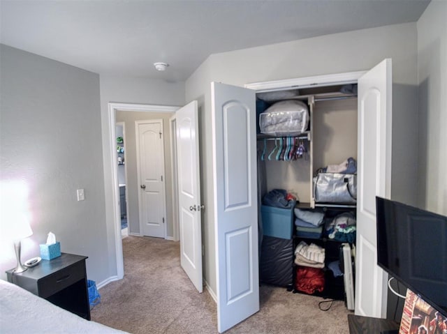 12825 William Penn Blvd, Oklahoma City, OK 73120 - bedroom with carpet floors, a closet, and baseboards