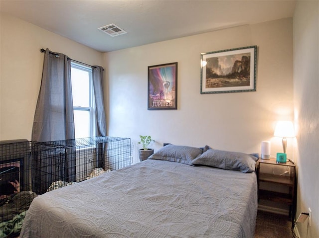 12825 William Penn Blvd, Oklahoma City, OK 73120 - bedroom featuring a tiled fireplace