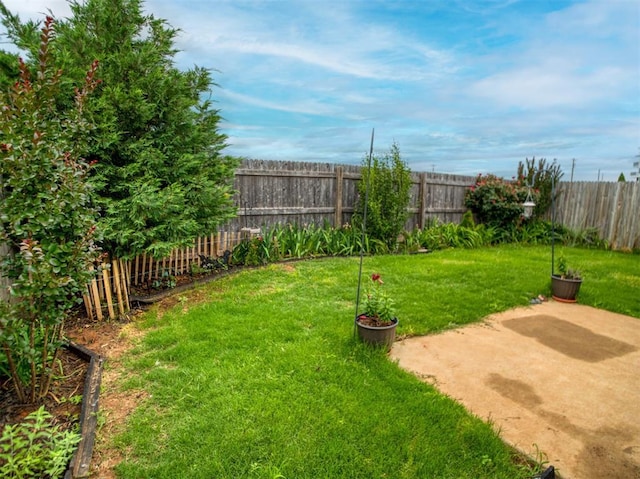 12825 William Penn Blvd, Oklahoma City, OK 73120 - view of yard with a patio