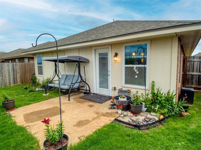 12825 William Penn Blvd, Oklahoma City, OK 73120 - back of house with roof with shingles and a patio area