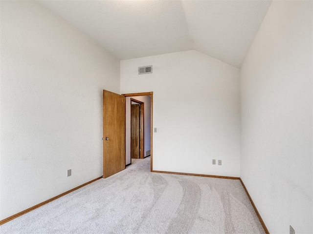 3130 SW 124th St, Oklahoma City, OK 73170 - empty room featuring lofted ceiling, carpet floors, and baseboards